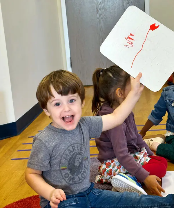 Young student in music class